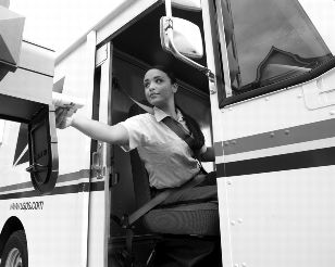 letter carrier delivering mail from an llv