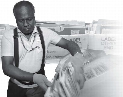 postal worker handling the mail