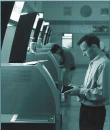 customer using an automated postal center